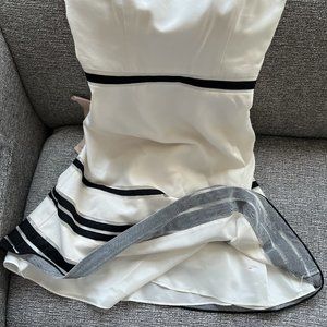 Brand new Ann Taylor strapless, silky cream-colored size 2P dress black stripes